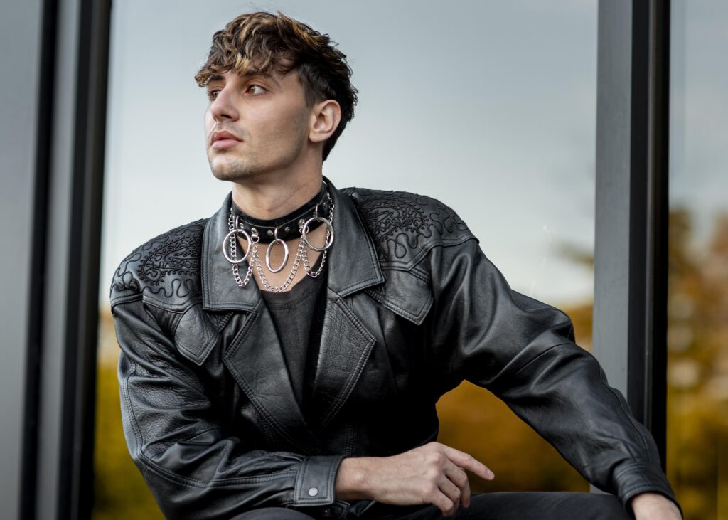 front view non binary person leather jacket